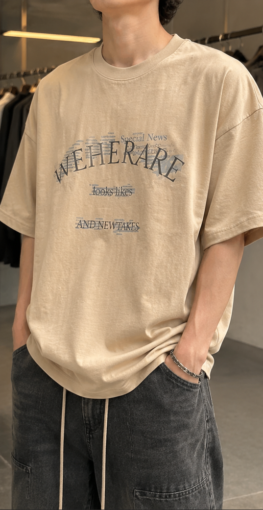 تی‌شرت لش باکسی با طرح گرافیکی نوشتاری WEHERARE | رنگ قهوه ای خاکی | Beige Oversized Boxy-Fit Graphic Tee with WEHERARE Print