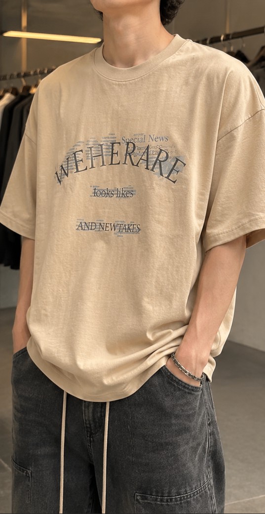 تیشرت لش باکسی با طرح گرافیکی نوشتاری WEHERARE رنگ قهوه ای خاکی Beige Oversized Boxy-Fit Graphic Tee with WEHERA...