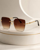 عینک زنانه بدون فریم پایین قهوهای عسلی مدل Luxury Infinity Gold