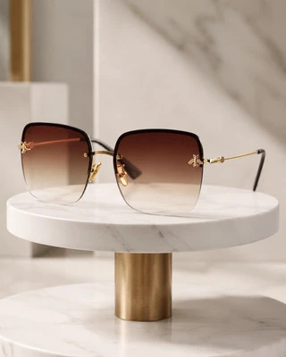 عینک آفتابی Gucci GG0982S با فریم فلزی طلایی و لنز گرادیانی قهوهای