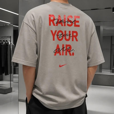 تیشرت مردانه خاکستری مدل Raise Your Air اورسایز با چاپ پشت گرافیکی پشت