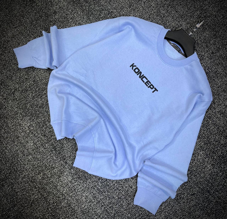 دورس یقه گرد مشکی با چاپ پشت طرح KONCEPT رنگ ابی پاستیلی | Minimalist Crewneck